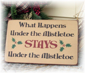 ... happens under the mistletoe STAYS under the mistletoe...Christmas sign