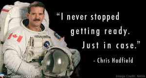 Astronaut Chris Hadfield in space suit with inspirational quote about