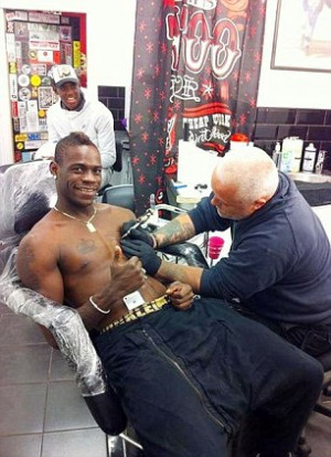 Who does he ink he is? Manchester City striker Mario Balotelli gets a ...