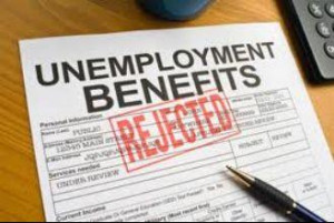 New applications for jobless benefits rose sharply last week, another ...