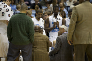 UNC head coach Roy Williams addresses his players during a timeout on ...