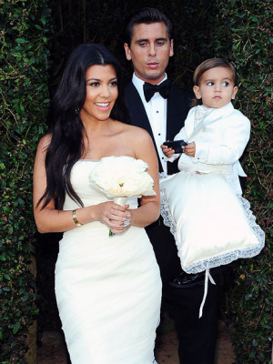 ... at the alter now the kourtney and scott wedding that i would watch