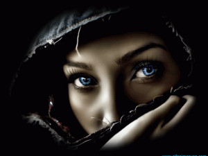 Mysterious_Woman_with_Blue_Eyes_Wallpaper_gm3a0.jpg