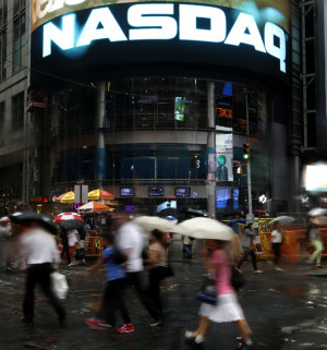 The Nasdaq logo is displayed on its building in New York, Thursday ...