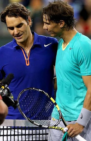Old friends: Roger Federer congratulates Rafael Nadal. Photo: Getty ...