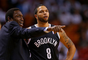 Avery Johnson points at the player on whom he wants Deron Williams to ...