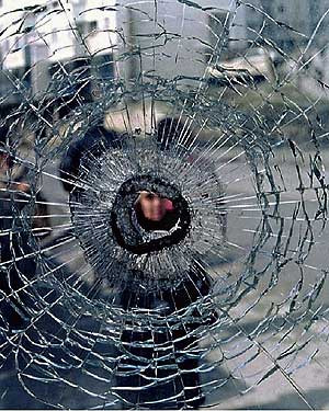 bullet hole in a window near Sarajevo's 