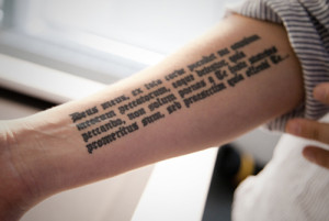 JP’s tattoo. He says it’s a prayer for forgiveness in Latin. I ...