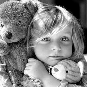 girl with teddy bears black and white photo of a cute little girl with ...