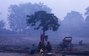 ... warm themselves up by a bonfire on a cold morning in the old quarters