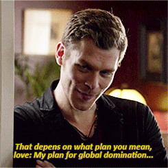 Klaus smiles at tha thought before watching the two as they sit down ...