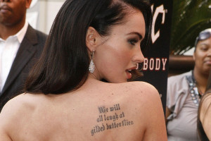 ... quote (from King Lear ) is on her right shoulder; among her other