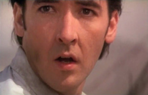 John Cusack as U.S. Marshal Vince Larkin in Con Air (1997)