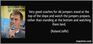Very good coaches for ski jumpers stand at the top of the slope and ...