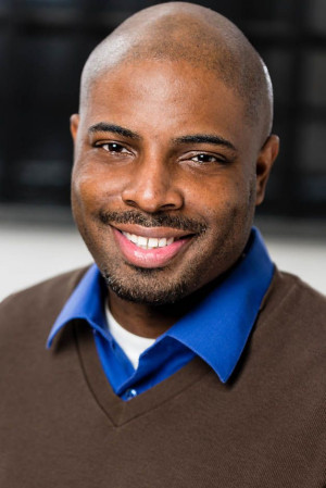 African American male commercial headshot wearing sweater.jpg