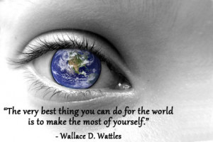 The world in a pupil of an eye with Wallace Wattle quote