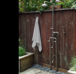 really like these outdoor showers with the industrial-style hardware ...