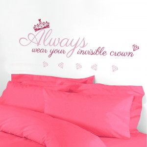... and Magenta Always Wear Your Invisble Crown wall decal behind a bed