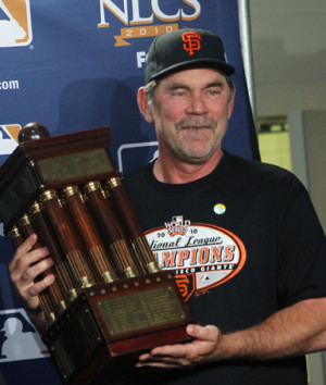 San Francisco Giants manager Bruce Bochy holds the Warren C. Giles ...