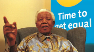 Former South African President Nelson Mandela is shown sitting in a ...