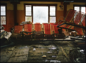 ... pool chairs lay abandoned at Grossinger's Catskill Resort and Hotel