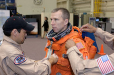 astronaut andrew j feustel sts 125 mission specialist dons a training