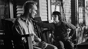 Robert Duvall as Boo Radley on the porch swing with Scout.