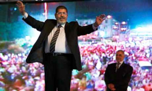 FIle photo: Mohammed Morsi holds a rally in Cairo, Egypt May 20, 2012 ...