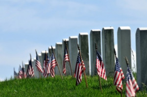 Flags adorn soldiers graves on Memorial Day also called Decoration Day ...