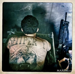 marine shows off the Corps' motto, Semper Fidelis (Latin for 