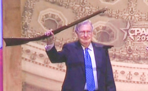 Mitch McConnell Holding Rifle