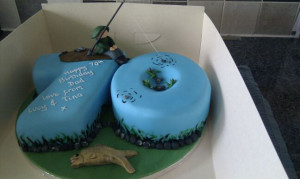 70th Birthday cake with a fishing theme.