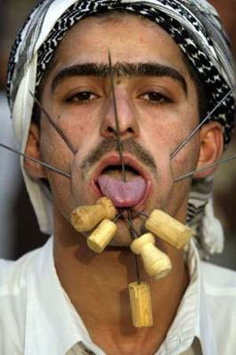 Dumb.com » Pictures » Tongue Piercing Fun Picture
