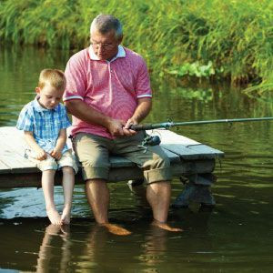 Grandpa and Grandson Fishing | Grandpa and grandson fishing on a dock