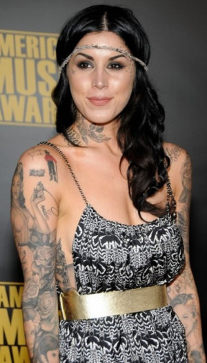 cute kat von d tattoo on arm and neck