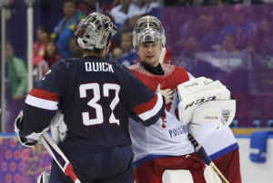 Team USA's goalie Jonathan Quick (L) talks with Russia's goalie Sergei ...