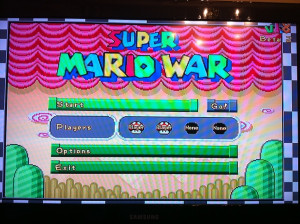 ... Het gaat om Super Mario War, een spel met in de hoofdrol… Mario