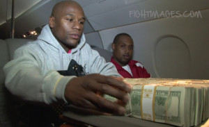 ... “Money” Mayweather shows off $1,000,000 on “Air Mayweather
