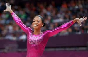 Gabrielle Douglas of the United States reacts after he competes on the ...