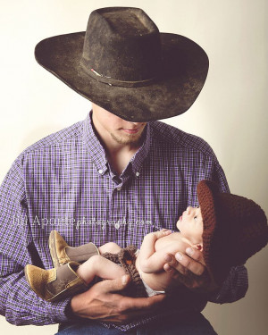 newborn photography posing cowboy boots hat father dad