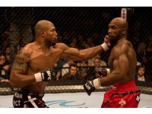 Article Tab: Quinton Rampage Jackson, left, delivers a left hook to ...