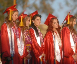 Sanders, center, smiles during the Rio Vista High School graduation ...