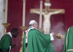 Pope Francis spreads incense as he arrives Sunday for a Mass in St ...