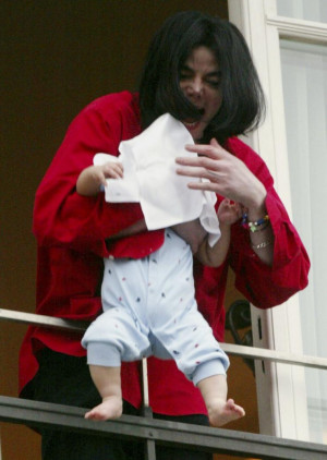 Michael Jackson with his son Blanket as an infant. This photo pictures ...
