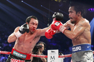 Pacquiao had been down in the third round but knocked Marquez down in ...