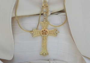 the pectoral cross with the central cluster of small rubies