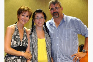 Rehtaeh Parsons, centre, with her mother, Leah, and an unidentified ...