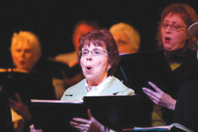 pat sharp and other members of the lakeshore community chorus perform ...