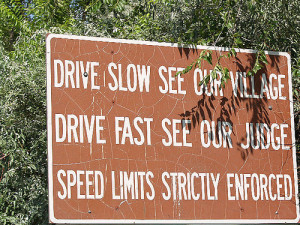 Drive Slow See our Village. Drive Fast, see our judge. Speed limit ...