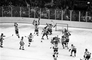 The U.S ice hockey team rushes toward goalie Jim Craig after their ...